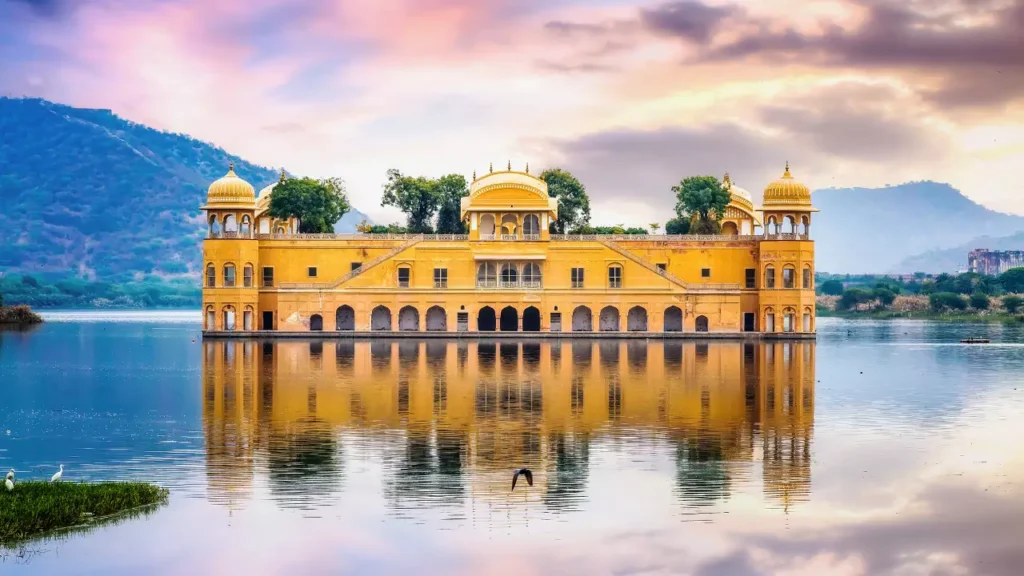 Photo of Jal Mahal water palace Jaipur Rajasthan with landscape at sunset